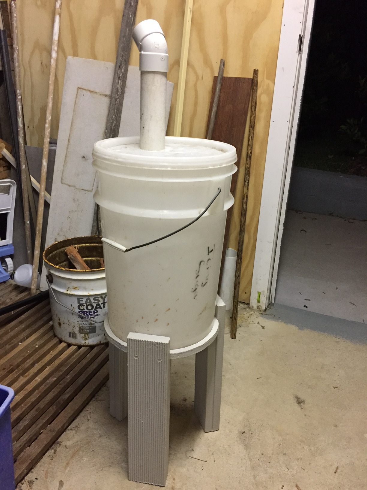 The water bucket sitting in the original stand