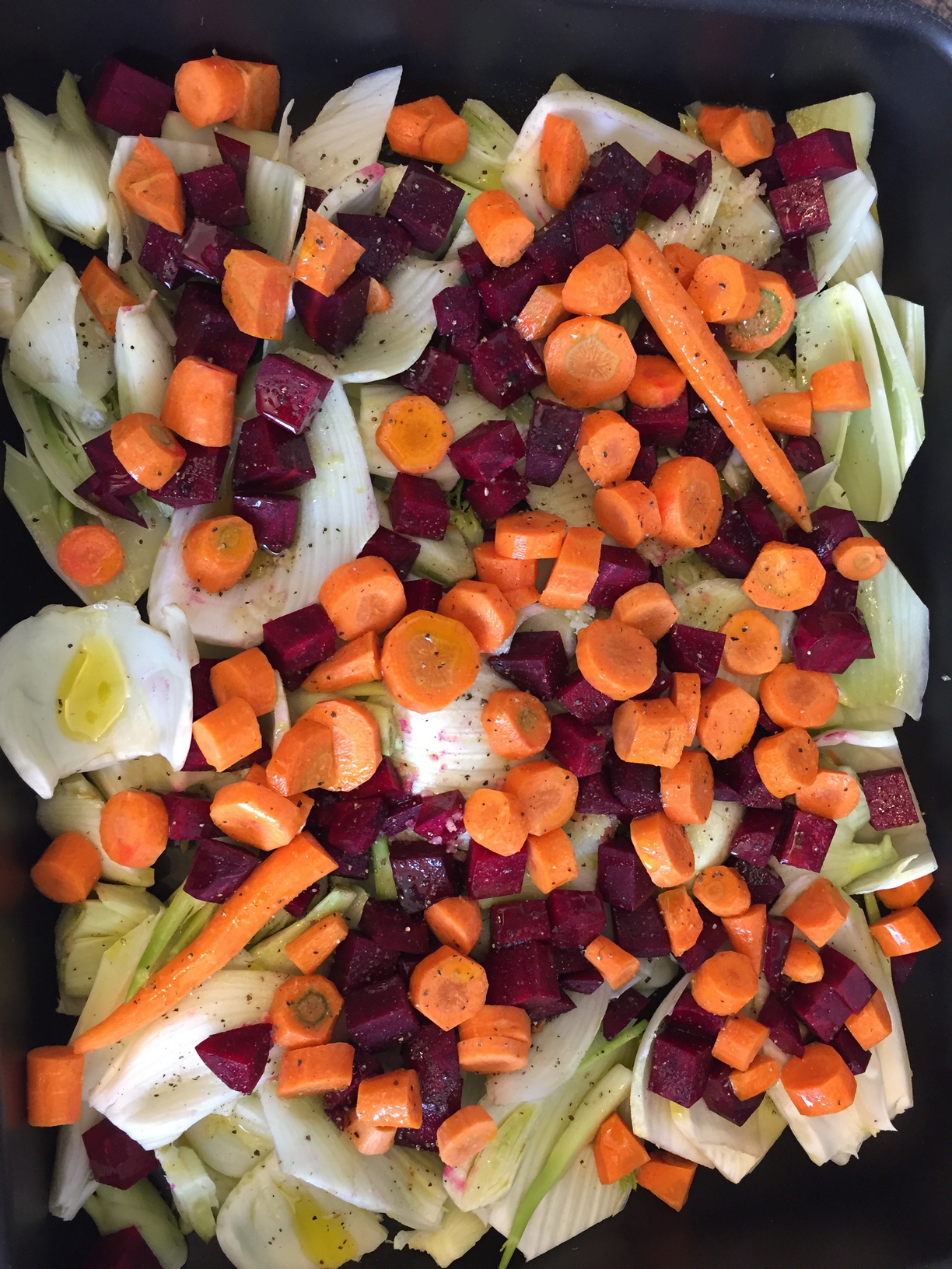 A vegetable bake with carrots, beetroot and fennel from the garden. A bit of salt, pepper and olive oil and it made a tasty accompaniment. The fennel could have been picked a little earlier as the inner core had gone a bit woody and some of the outer stems were a bit tough, but overall it was a success.