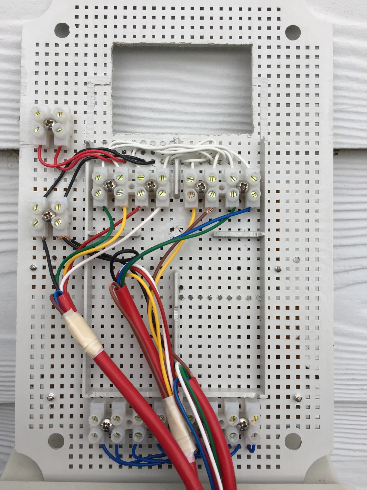 Close-up of the wiring into the terminal strips. I'm glad I had this picture to refer to, as I promptly forgot which colour wire was connected to which zone and didn't know what solenoid to connect to which coloured wire!
