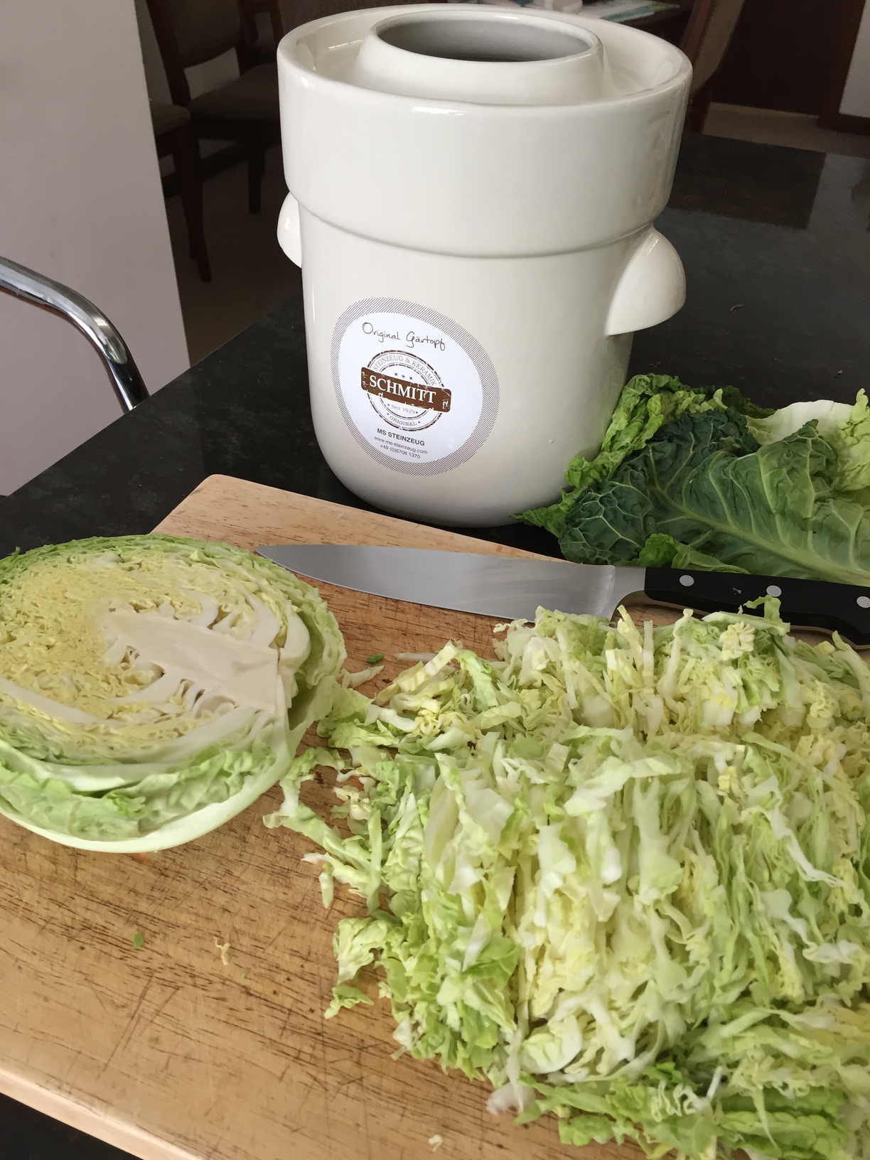 Chopped cabbage and the fermenting crock